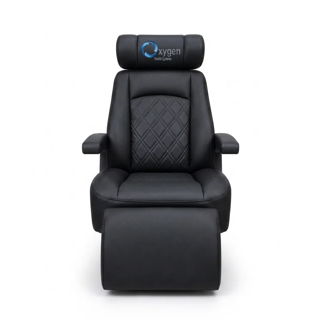 Black diamond-quilted leather reclining chair with Oxygen Health Systems branded headrest, padded armrests, and an extended footrest