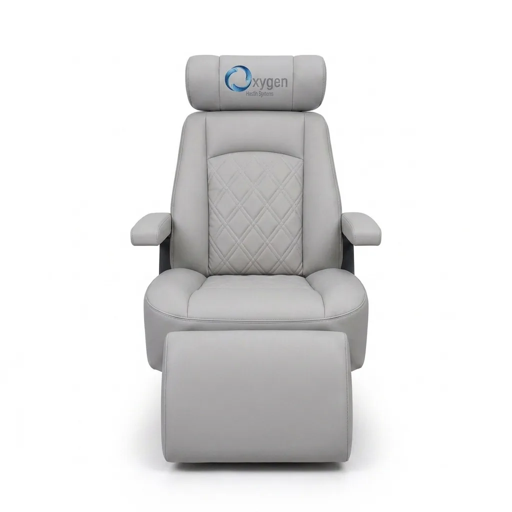 Powder gray diamond-quilted leather reclining chair with Oxygen Health Systems branded headrest, padded armrests, and an extended footrest