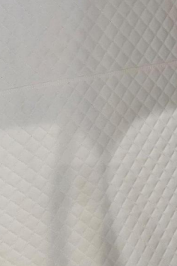 Cream quilted diamond-pattern leather interior lining option for the Elite Comfort 34D hyperbaric chamber